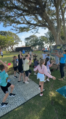 Kids' party in a Netanya park with inflatables, games, and face paint