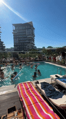 Adults enjoy pool volleyball and swimming in Kâğıthane