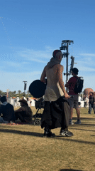 Outdoor event with red tent venue documented in Indio