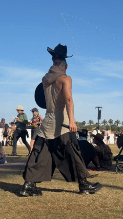 Outdoor event with red tent venue documented in Indio