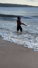 Morning beach activities captured at Kuta, Indonesia