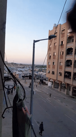 Street life and play continue in damaged Khan Yunis