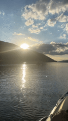 Kayak-level sunset view on Dospat Lake, Bulgaria