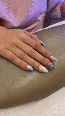 Woman displays decorative nail art in Sofia