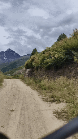 Keylang's mountain roads, valleys, and terraced fields on a cloudy morning