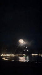 Fireworks Display Over Water in Choeng Thale, Thailand