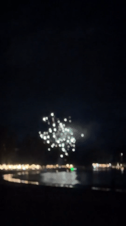 Fireworks Display Over Water in Choeng Thale, Thailand