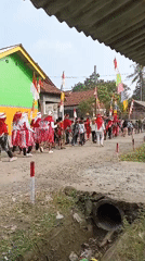 Indonesian Independence Day procession rolls through rural Desa Rawajaya