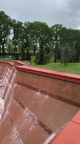Morning park visitors document fountains and mist in Krasnodar