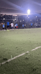 Evening soccer match played on indoor turf in Nigeria