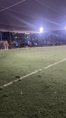 Evening soccer match played on indoor turf in Nigeria