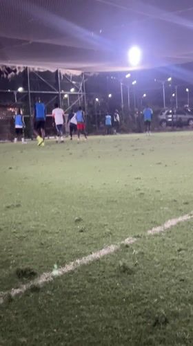 Evening soccer match played on indoor turf in Nigeria