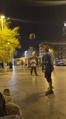 Young people skateboard, play basketball in Barcelona plaza