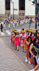 Traditional parade with colorful costumes fills Cuzco streets