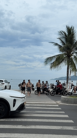 Nha Trang beach in full swing on a cloudy August morning