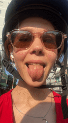 Woman records selfie video in Nha Trang urban area
