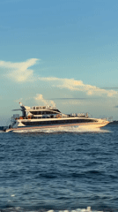 Speed boat crosses calm waters near Denpasar, Indonesia