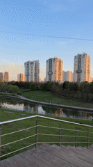 Moscow park fountain and skyline views captured during sunset