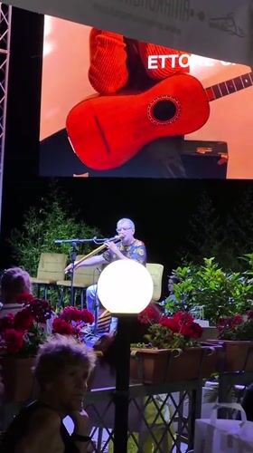 Live music and street festival buzz in Tropea on a June evening