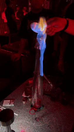Night out at a North Jakarta club with DJ, crowd, and table service