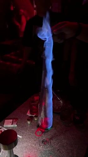 Night out at a North Jakarta club with DJ, crowd, and table service