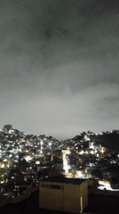 Caracas residents captured during routine nighttime urban activities