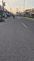 Vehicle records street-level view of Lhokseumawe road