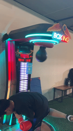 Late-night rounds on a Boxing arcade machine in Arica
