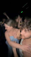 Young people dance at Sofia nightclub under colorful lights