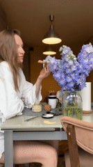 Woman enjoys quiet meal at home in Khimki