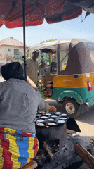 Morning street life unfolds in Jos, Nigeria marketplace