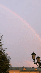 Rainbows and rooftops over Izhevsk on a hazy June evening