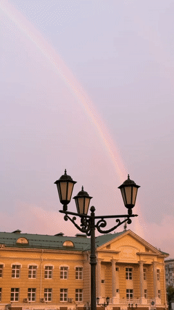 Rainbows and rooftops over Izhevsk on a hazy June evening