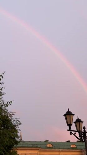 Rainbows and rooftops over Izhevsk on a hazy June evening