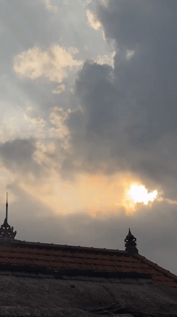 Cloudy morning light over a Balinese villa compound in Ubud