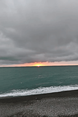 Sunset documented over Black Sea beach in Kobuleti, Georgia