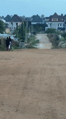 Developing Abuja neighborhood documented through 30 street-level observations