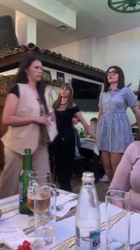 Family celebration with traditional dancing at Bulgarian restaurant