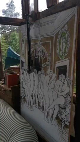 The video shows a room with large windows that look out onto a lush green landscape. The room is decorated with various items, including a long striped couch, a desk with books and papers, and a bed with a pink comforter. There is also a large painting of people dancing in a room. The video pans around the room, showing different angles and perspectives.