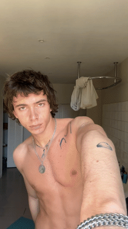 Individual documented in bathroom setting in Lourmarin, France