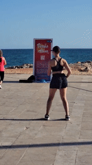 Beachfront fitness and kite surfing on a sunny Quarteira afternoon