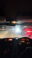 Late-night road view from inside a vehicle in Klepu.