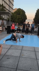 Breakdancers perform in a Vitoria-Gasteiz public square