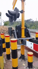 KAI passenger train clears an active crossing in Pasirmuncang