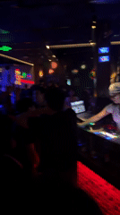 Nightclub and bar scene in Liangjiang with DJ sets and pool