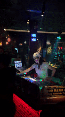 Nightclub and bar scene in Liangjiang with DJ sets and pool