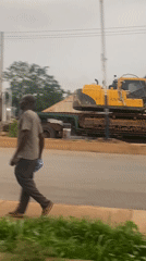Construction equipment transported through Bukuru, Nigeria