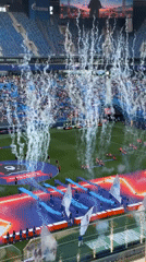 Packed Russian stadium hosts colorful pre-match ceremony with pyrotechnics