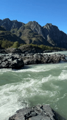 River rapids flow through rocky terrain near Еланда, Russia