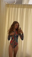 Woman takes fitting room selfies in Montenegro coastal town